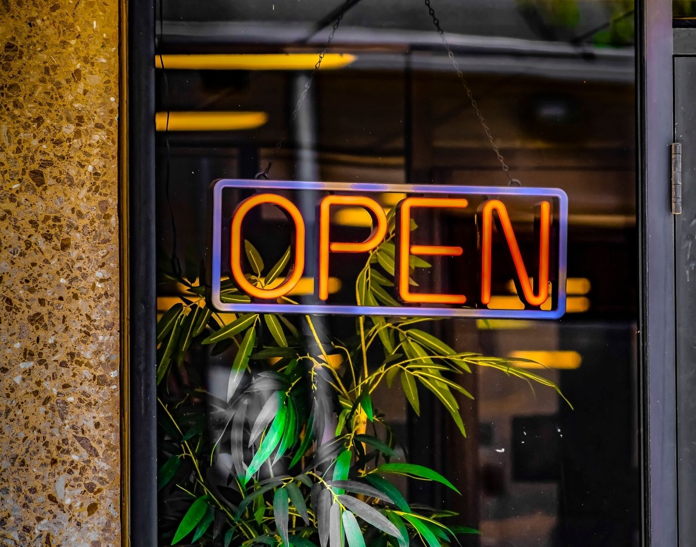 Red LED open sign in the window of a restaurant