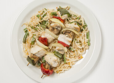 image showing chicken skewers and noodles