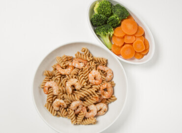 Picture of prawn and tomato pasta and mixed vegetables