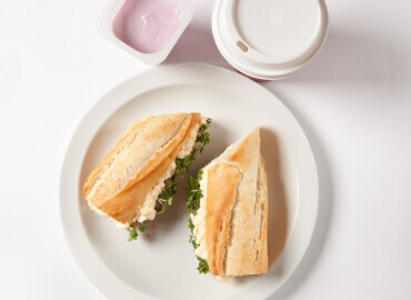 Photo of an egg and cress mayonnaise baguette, fruit yogurt and skinny latte