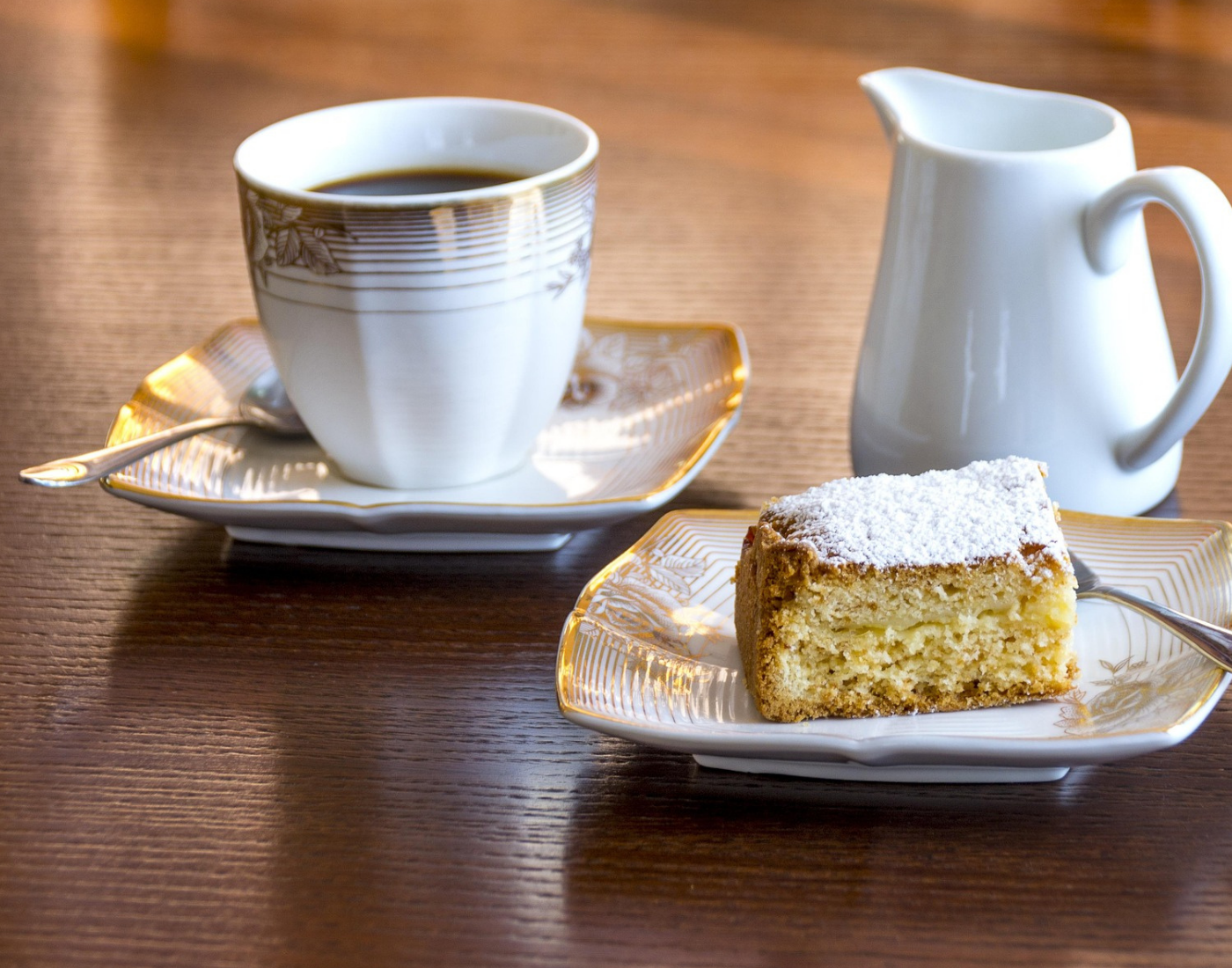 coffee and dessert cake on a restaurant table