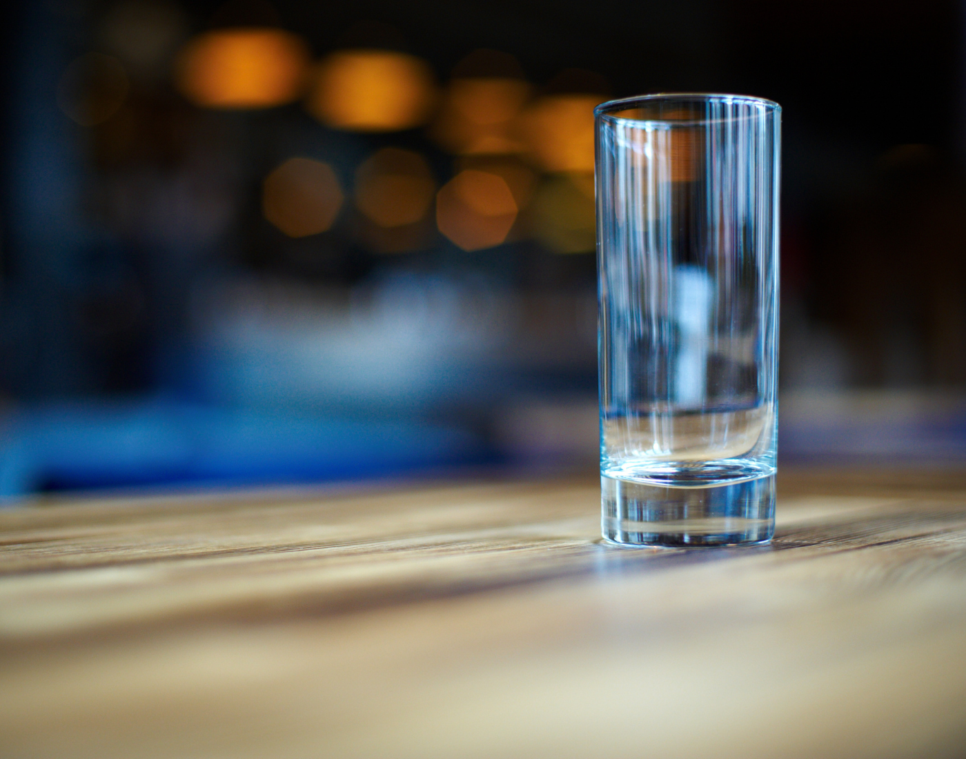 an empty drinks glass sitting on a table