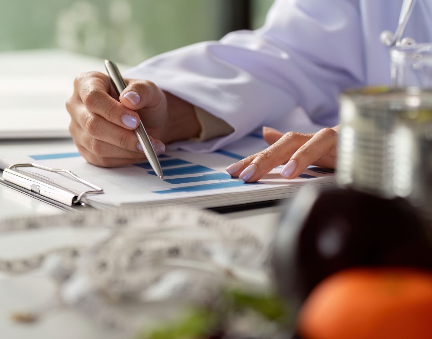 Researcher charts health data while assessing dietary options