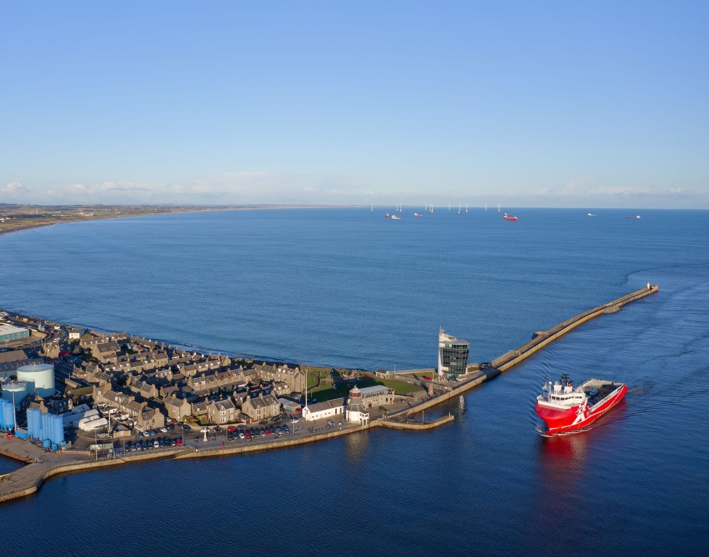 A cargo boat arriving at the harbour port in Aberdeen in Scotland