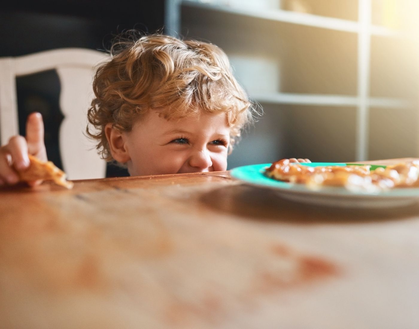 Pre-school child eating food