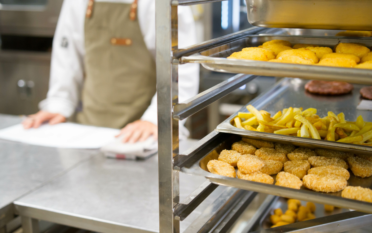 Burgers, chicken nuggets, chips waiting to be served to customers