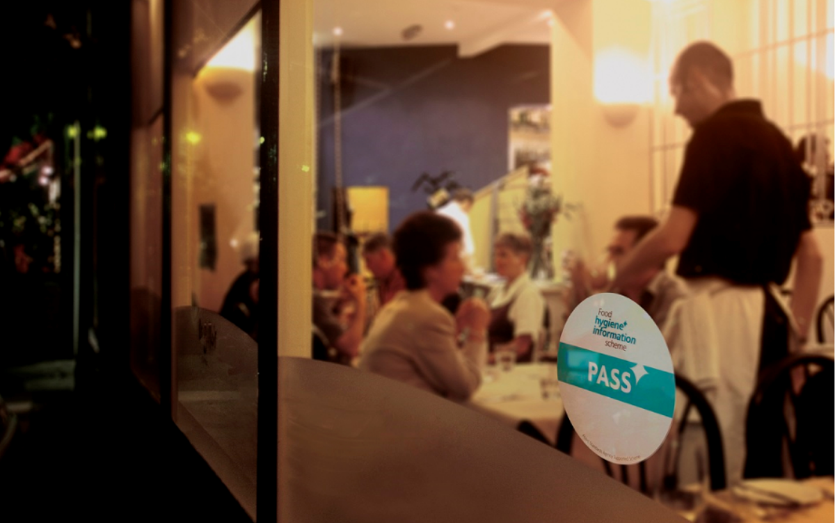 Restaurant window showing Food Hygiene Information scheme sticker