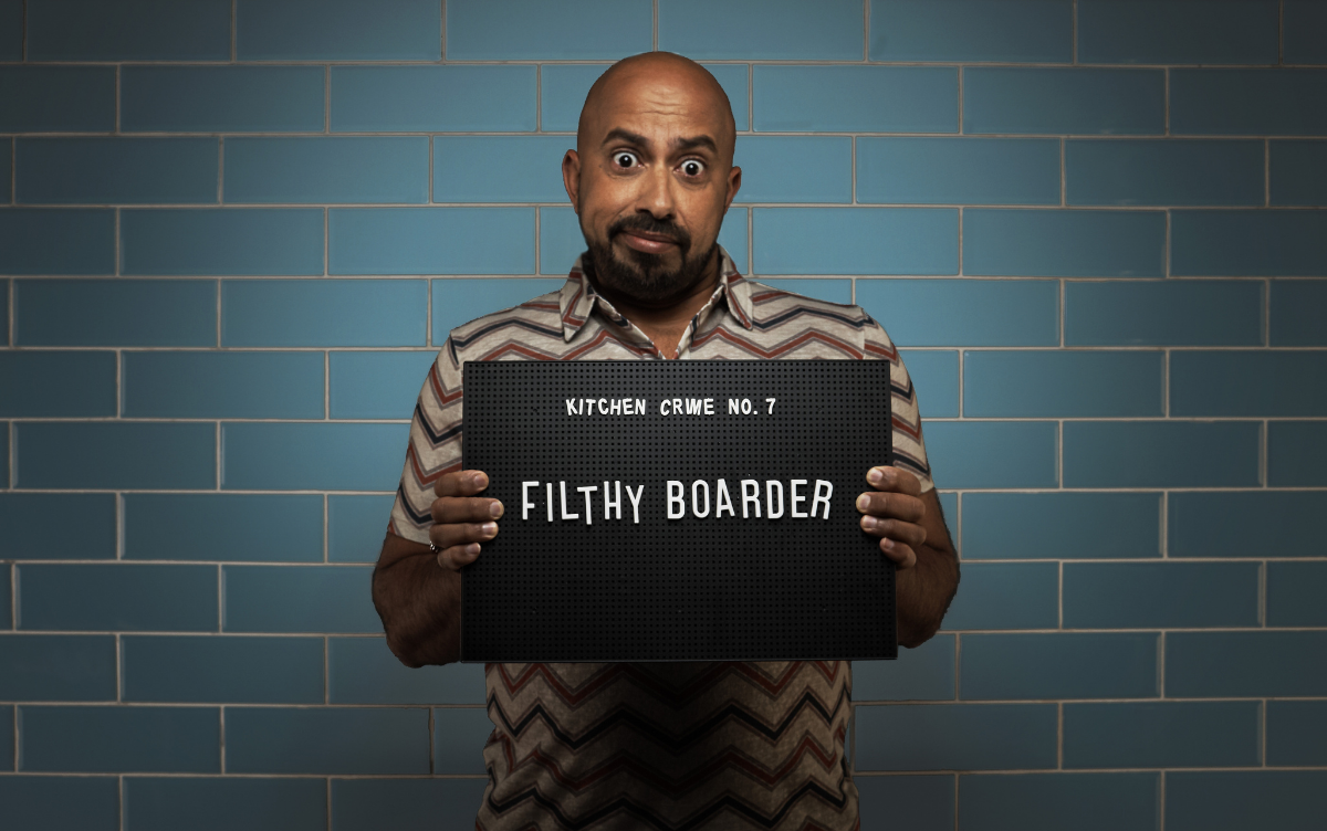 Woman holding mug shot board with words Filthy Boarder