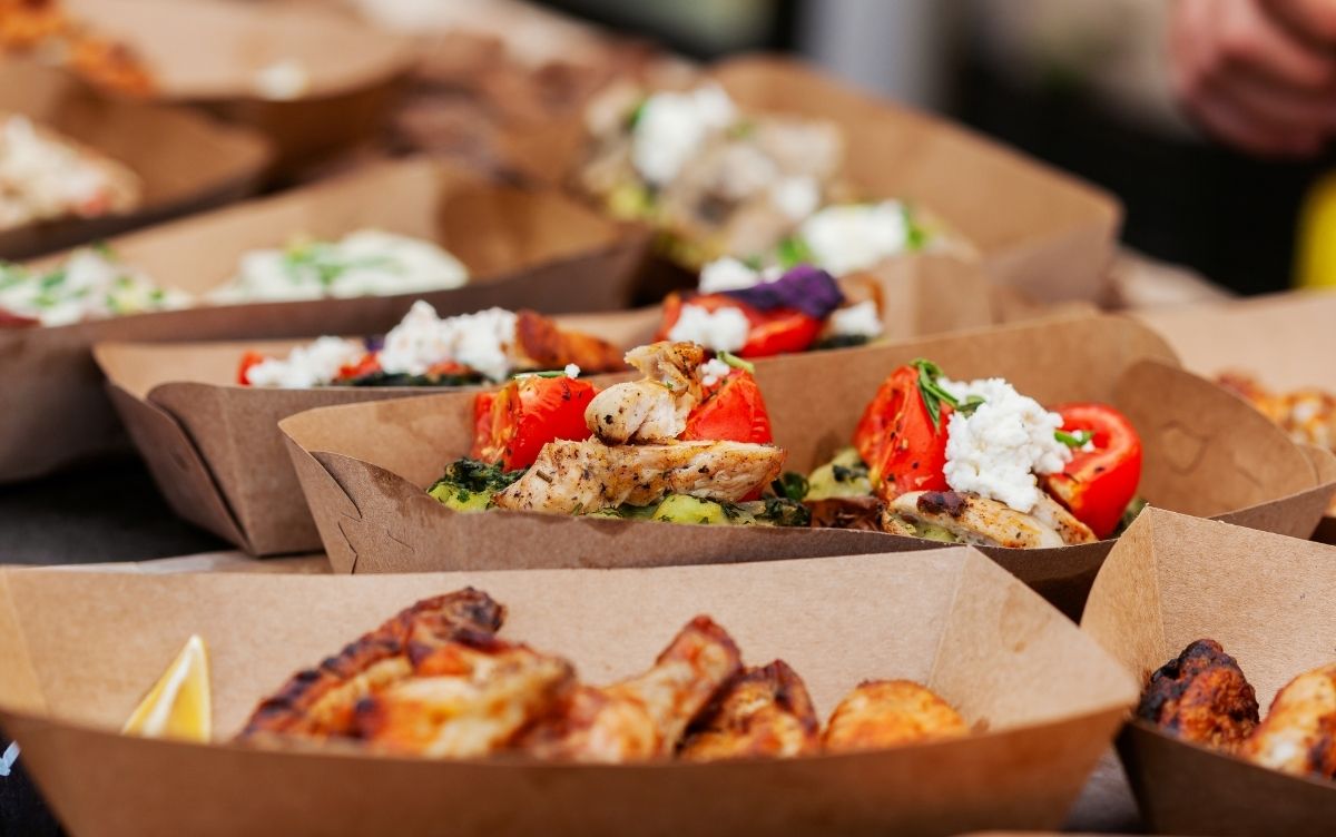 Selection of takeaway food options in cardboard containers