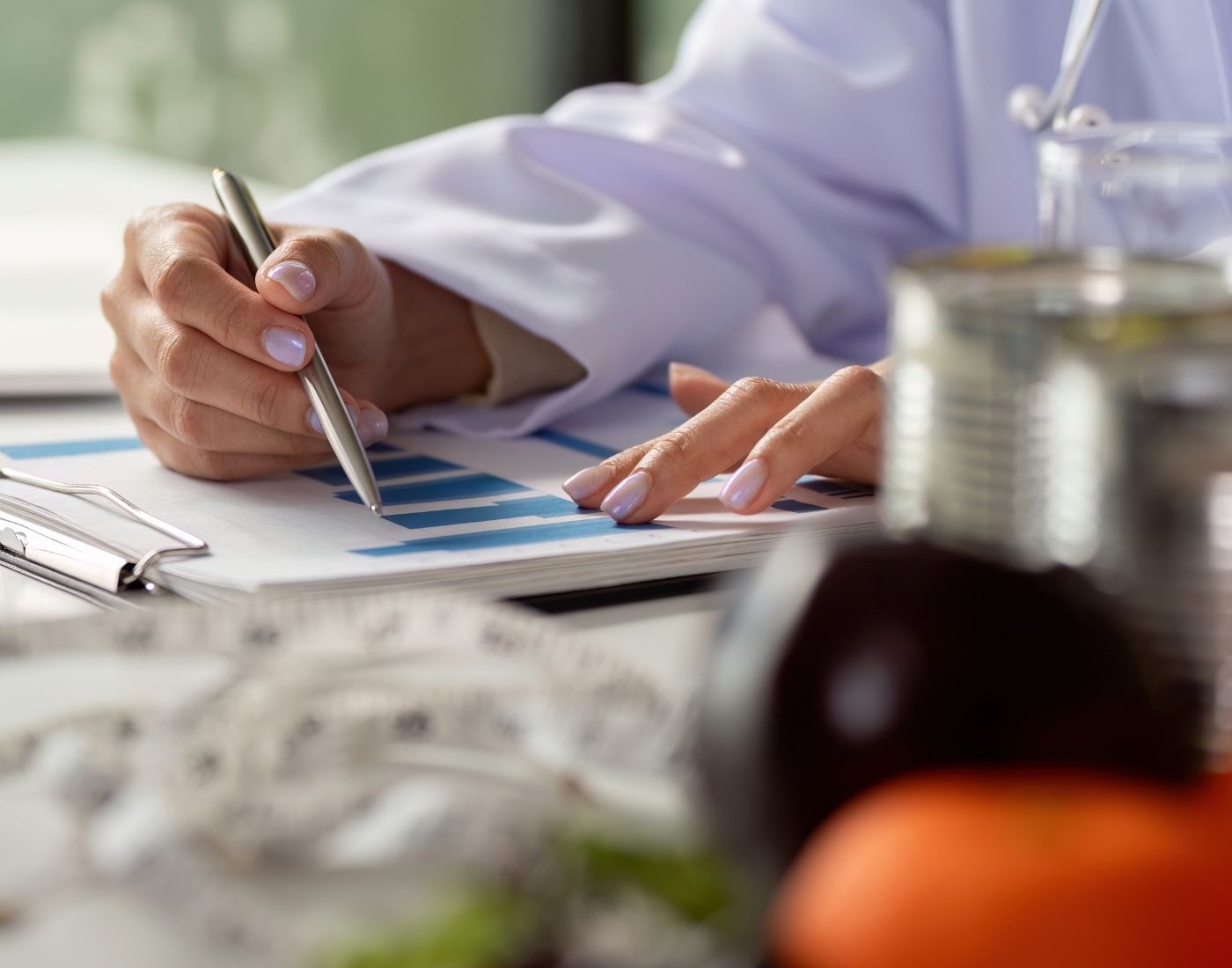 Researcher charts health data while assessing dietary options